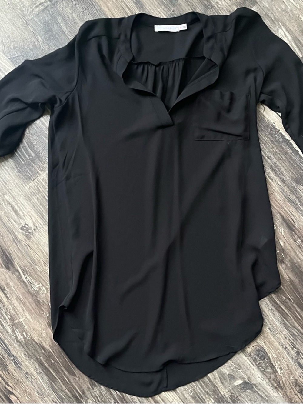 Lush Sheer Black Split-Neck Asymmetrical Blouse with Chest Pocket